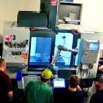Image - Cobots load and unload Haas CNC machines